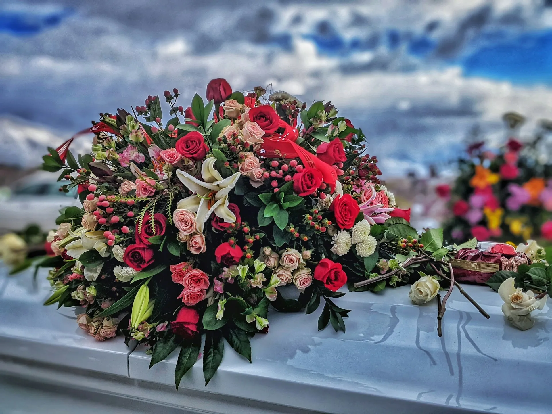 Funeral flowers on hearse